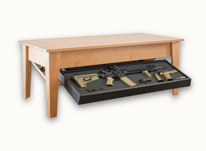 Coffee table with hidden firearms compartment