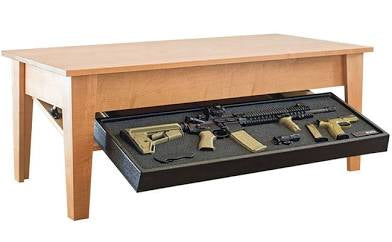 Coffee table with hidden firearms compartment